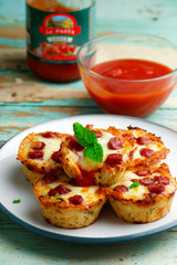 cauliflower pizza bites. selective focus