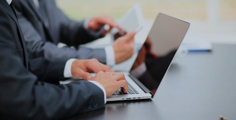 business people working with digital tablet and laptop