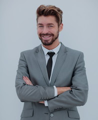 Portrait of a smiling handsome business man  over white backgrou