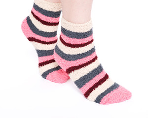 Multicolor women's fuzzy ankle socks with stripes isolated on white background
