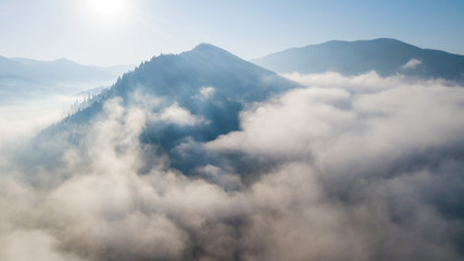 Aerial view of the mountains with a morning fog