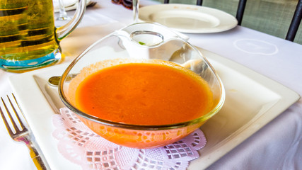 Spanish tomato gazpacho soup in the plate.