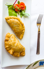 Small cakes are on the plate.