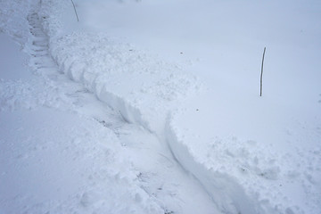 a footpath cleaned out of snow.