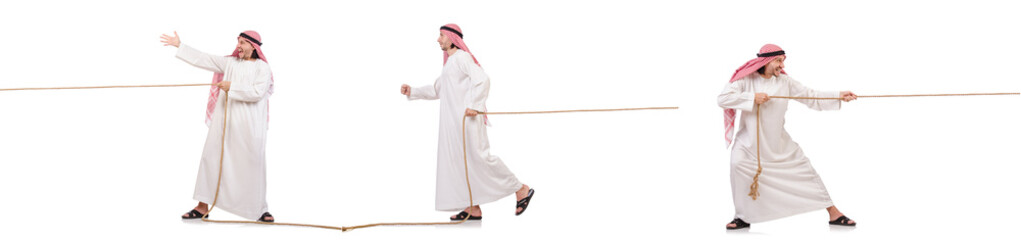 Arab in tug of war concept on white