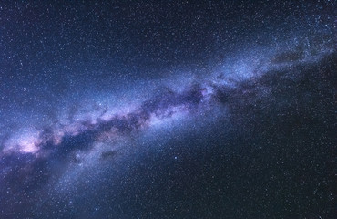 Milky Way. Fantastic night landscape with bright milky way, sky full of stars. Shiny stars....