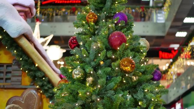 Close up of beautifully decorated Christmas tree and gifts. Holiday Christmas scene. Christmas gifts under the Christmas tree.
