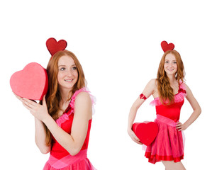 Pretty young model in mini pink dress holding gift box isolated 