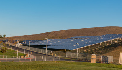 Solar panels on a hillside 