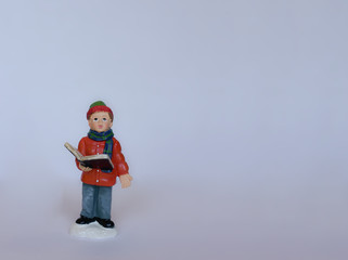 little boy figure reading book isolated on white background