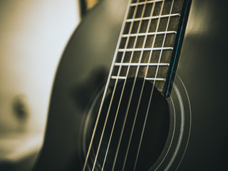 Fototapeta premium macro shot of strings of classical acoustic guitar