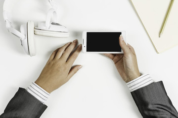 Businesswoman using her smartphone