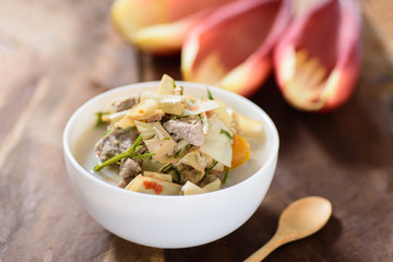 Thai food (Kaeng Hua Plee), spicy banana flower soup with pork in a bowl