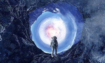 Space hole and astronaut. Mixed media
