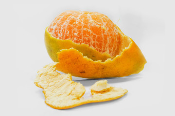 Peel of an orange on white background