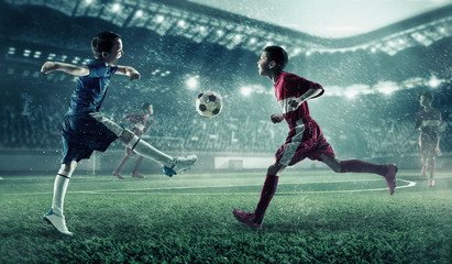 Obraz na płótnie Canvas Children play soccer. Mixed media
