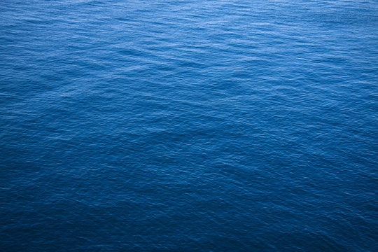 Fototapeta The surface of the blue sea.