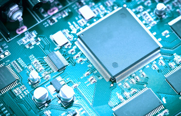 close up of electronic circuit chip on pcb board
