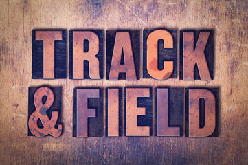 Track & Field Theme Letterpress Word on Wood Background