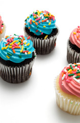 Blue and Pink Muffins on White Background