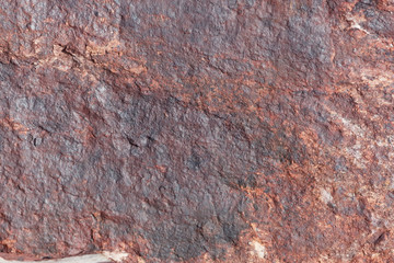 Surface of sandstone covered by iron oxides