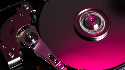 Disassembled hard drive from the computer, hdd with mirror effect Opened hard drive from the...