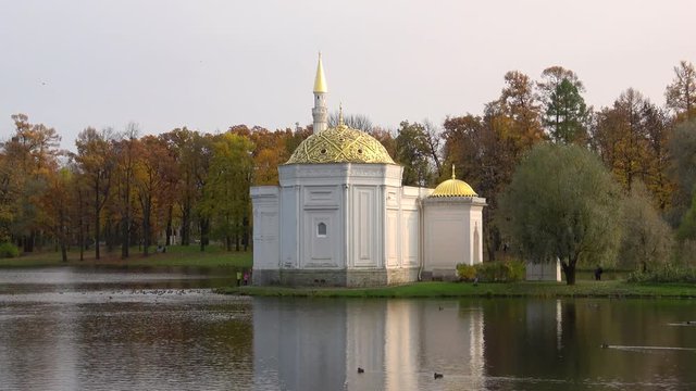 The Turkish bath pavilion on the bank of a pond, cloudy october day. Tsarskoye Selo