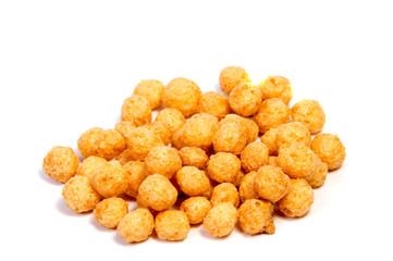 Falling flakes breakfast cereal isolated on white background. Healthy breakfast.