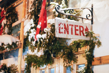Store entrance sign covered by snow - 184234658