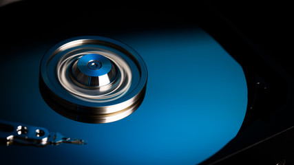 Disassembled hard drive from the computer, hdd with mirror effect Opened hard drive from the computer hdd with mirror effects Part of computer pc.