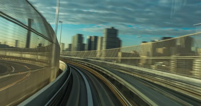 Time lapse of automatic train moving to tunnel in Tokyo, Japan. 4K