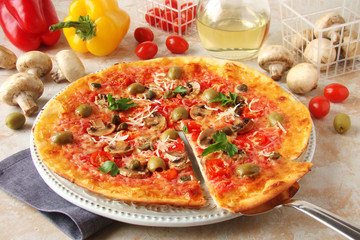 Pizza with tomatoes, mushrooms, black olives, Parmesan cheese, capers