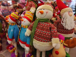 soft children's toys snowmen in the store.