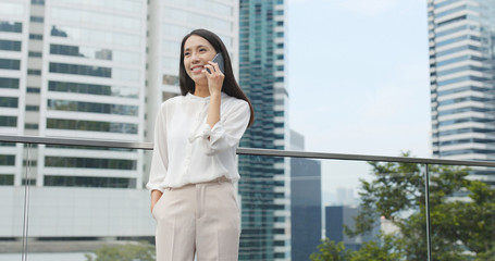 Fototapeta premium Businesswoman talk to cellphone