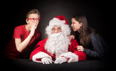 Teenagers tells Santa about their wishes for the christmas presents.