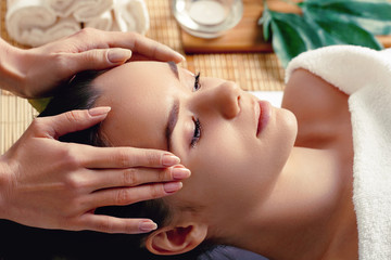 Obraz na płótnie Canvas Massage and body care. Spa body massage treatment. Girl having massage in the spa salon.Woman Skin Care.