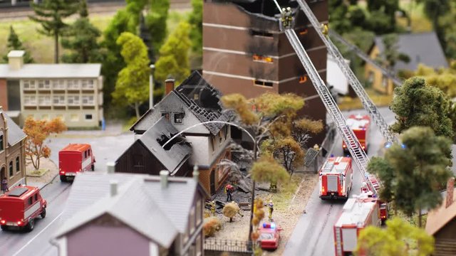 Example of smoke pouring out of attic vents of house on fire. Fire protection. Extinguishing the fire in slow motion. 3840x2160