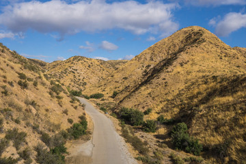 Road through California canyons in the wilderness of Angeles National Forest.