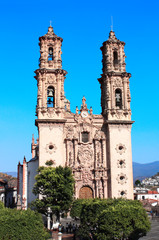 Fototapeta na wymiar Facade of Santa Prisca Parish Church, Taxco de Alarcon city, Mexico