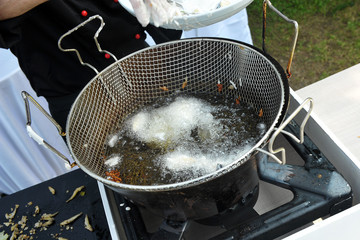 Fry with boiling oil. Cook with fried oil. Frying fish and vegetables