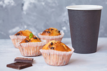 Coffee break with chocolate muffins