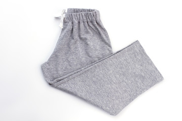Simple gray melange boys' pants on white. Waistband and drawstring. Comfy pajama bottom for night rest.