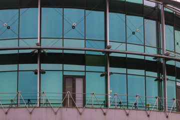  Modern office building with facade of glass close-up