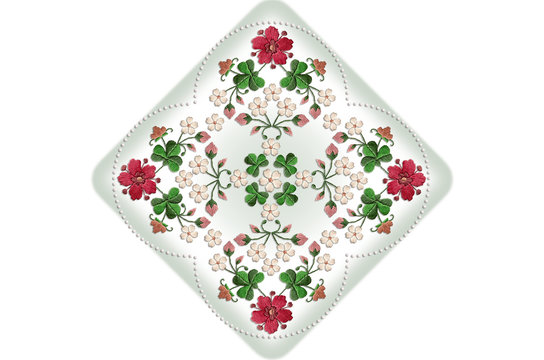 Pattern for embroidery decorative pillow with bouquets of flowers and clover leaves on greenish background
