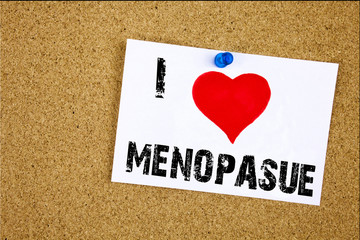 Hand writing text caption inspiration showing I Love Menopause concept meaning Midlife Crisis Grand Climacteric Loving written on sticky note, reminder isolated background with copy space