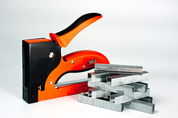 Stapler household, new, orange, reliable with staples
