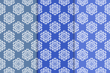 Set of floral ornaments. Vertical blue seamless patterns