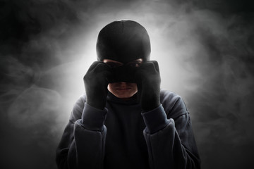 Thief wearing a mask