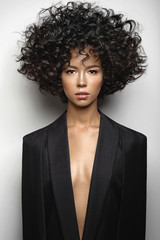 Beautiful woman with afro curls hairstyle - 184251407