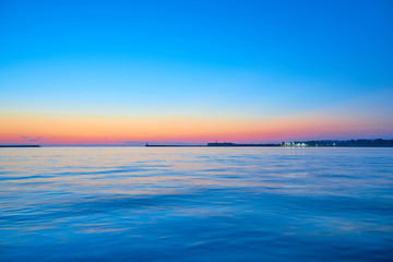 Obraz premium Clear simple sea sunset in blue and pink coloures